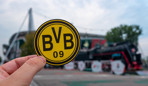 August 30, 2021, Dortmund, Germany. The emblem of the Borussia Dortmund football club on the background of a modern stadium.