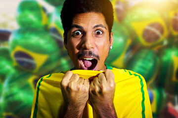 Afro Brazilian Man With Yellow Shirt Soccer team for the 2022 Cup, cheering for Brazil to be the...