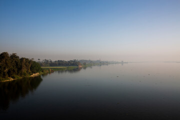 foggy sunrise over the Nile river 