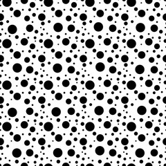 Fototapeta na wymiar Abstract background with black and white circles. Seamless pattern