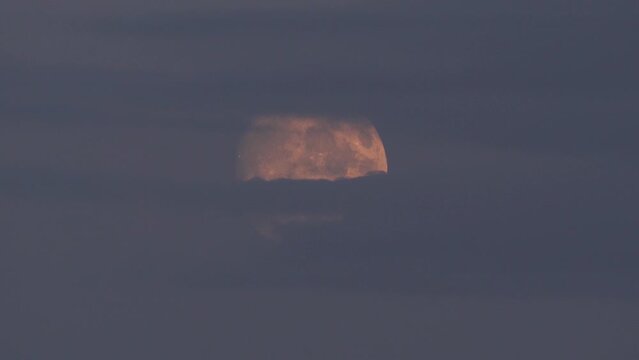 A glimpse of the moom getting smaller and smaller