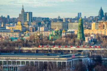 Fototapeta na wymiar View of Moscow from the observation deck on the Sparrow Hills. Blurry image.