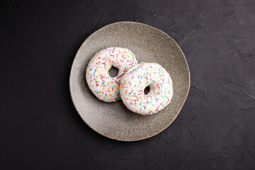 Donut, dessert donuts on a black background