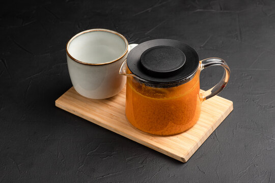 Tea, hot fruit teas on a black background