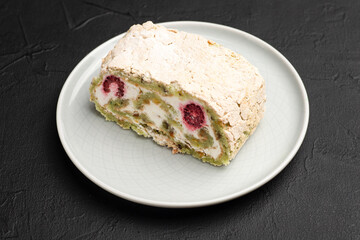 Dessert, sweet dessert with raspberries and on a black background