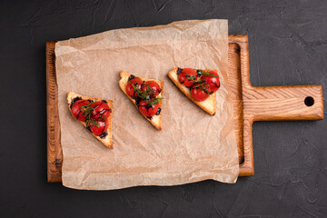 Bruschetta, different bruschetta with different fillings on a black background