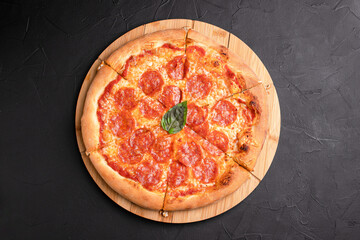 Pizza, different pizzas with different fillings on a black background