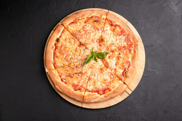 Pizza, different pizzas with different fillings on a black background