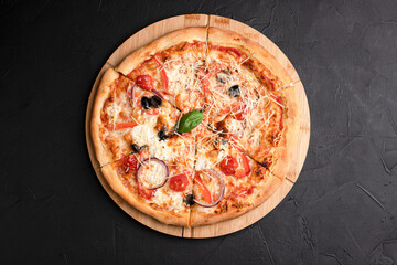 Pizza, different pizzas with different fillings on a black background