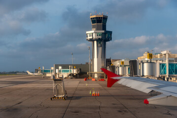 View from an airplane in the boarding area of the control tower of the Barranquilla airport....