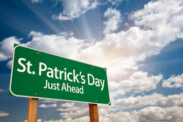 St. Patricks Day Just Ahead Green Road Sign and Clouds