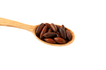 Brazil nuts or Baru seed, also known as baru nut, or chiquitania almond in wooden spoon, close-up