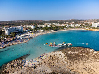 Fototapeta premium Aerial panoramic view on blue crystal clear water on Mediterranean sea near Nissi beach, Ayia Napa, Cyprus