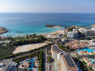 Fototapeta na wymiar Aerial panoramic view on blue crystal clear water on Mediterranean sea near Nissi beach, Ayia Napa, Cyprus
