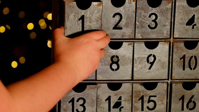 Christmas advent calendar.child opens the advent calendar.Gifts and surprises. 4k footage