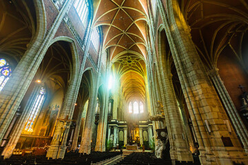 Impressive gothic interior of Saint Bavo Cathedral of Catholic Church in Ghent, Belgium