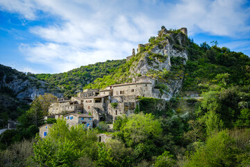 View on Rochecolombe medieval village, perched on its hill in the South of France (Ardeche)