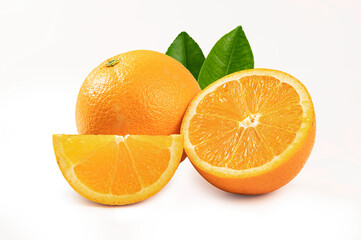 Orange with cut in half and leaves on a white background