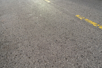 Fototapeta na wymiar Asphalt old road texture and yellow line