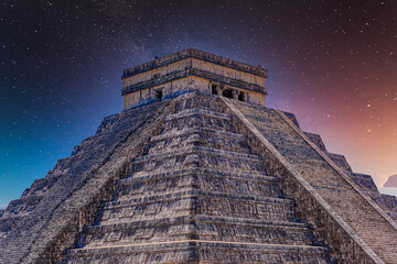 Temple Pyramid of Kukulcan El Castillo, Chichen Itza, Yucatan, Mexico, Maya civilization with Milky Way Galaxy stars night sky