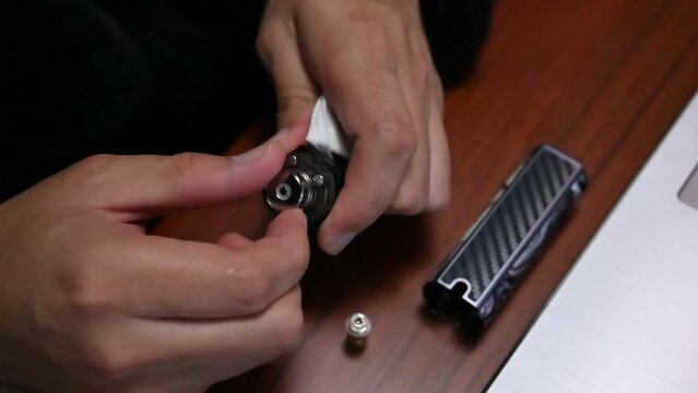 Rebuildable drip vaping atomizer tools, coil change closeup