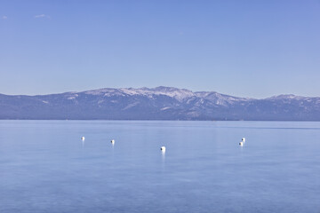 Fototapeta na wymiar Mountain Range Between Lake and Sky at Lake Tahoe