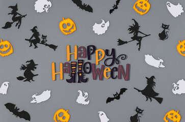 Pastel pattern made of bats, witches, little cute ghosts and jack-o'-lantern . Creative Minimal Halloween concept. Flat lay
