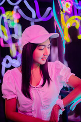 Nightlight concept, Asian woman  lifestyle holiday travel at shopping Asiatique, drink and eat in a...