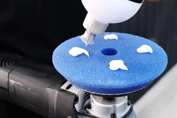 Car detailing. Polishing pads and polishing paste close-up. The concept of car paintwork polishing