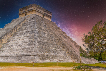 Temple Pyramid of Kukulcan El Castillo, Chichen Itza, Yucatan, Mexico, Maya civilization with Milky Way Galaxy stars night sky