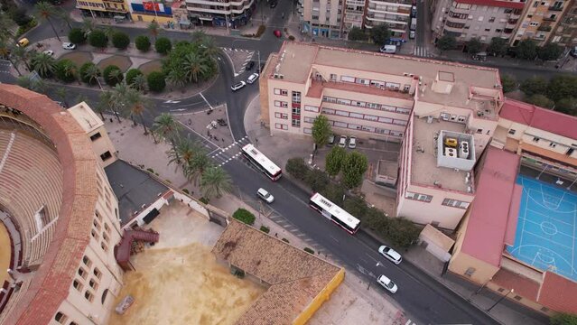 Alicante, Spain. Aerial View of Plaza de Toros Bullring and Residential Neighborhood, Revealing Drone Shot