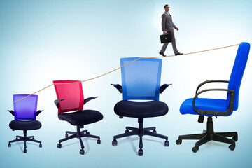 Promotion concept with businessman and chairs