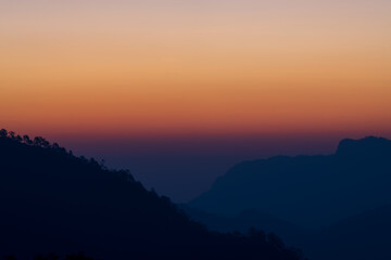 Background of colorful sky concept: Dramatic sunset with twilight color sky and clouds