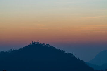 Background of colorful sky concept: Dramatic sunset with twilight color sky and clouds