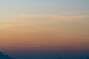 Background of colorful sky concept: Dramatic sunset with twilight color sky and clouds