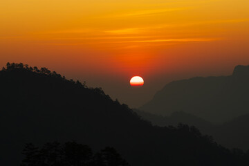Background of colorful sky concept: Dramatic sunset with twilight color sky and clouds