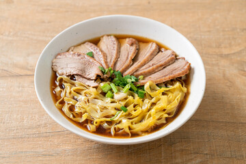 egg noodles with stewed duck in brown soup