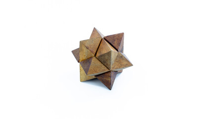 Wooden puzzle to challenge mind and test nerves isolated on white background