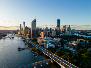 Aerial view of Brisbane city in Australia at sunset - obrazy, fototapety, plakaty