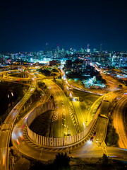 Aerial vertical view of Brisbane city and highway traffic in Australia at night - 537153258