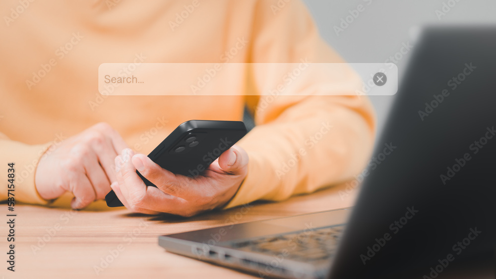 Poster Man using a mobile phone in the room for searching browsing internet data information. Business concept for smartphone using search with your website.
