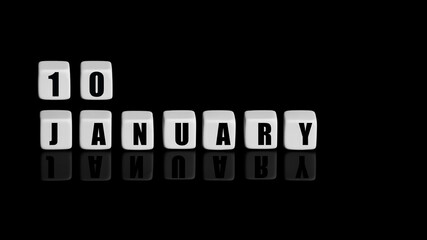 January 10th. Day 10 of month, Calendar date. White cubes with text on black background with reflection.Winter month, day of year concept