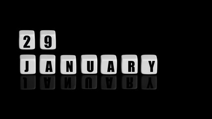 January 29th. Day 29 of month, Calendar date. White cubes with text on black background with reflection.Winter month, day of year concept