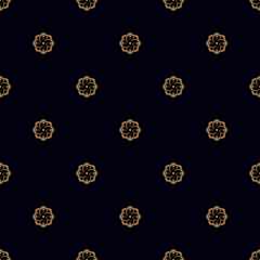 Modern gold flowers seamless pattern in dark background