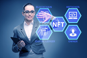 Businesswoman in NFT non fungible concept