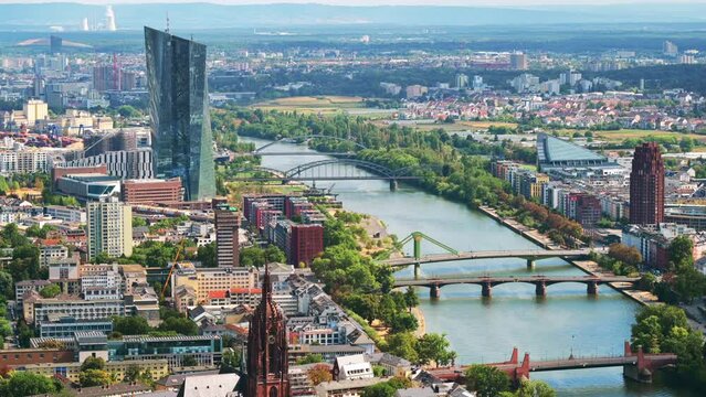 View of Frankfurt from a skyscraper, Germany. Multiple residential and office buildings, skyscrapers, Cathedral, river Main