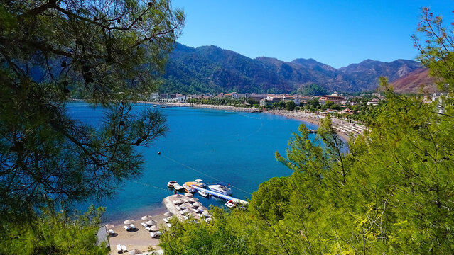 Icmeler Beach view in Marmaris Town. Summer landscape on the Mediterranean coast in Turkey.