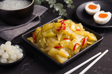 chinese pickled mustard greens , spicy salad pickle cabbage with sesame oil