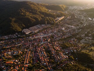 Aerial view of industrial zone from Resita city, Romania. Photos represent the old metallurgic and heavy machine constructing factories. Captured from drone.