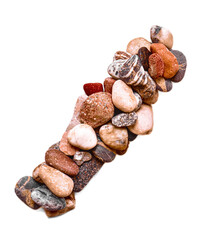 A letter of smooth stones on a white isolated background. Of the river stones lined with a letter, detailing, close-up. Selective focus